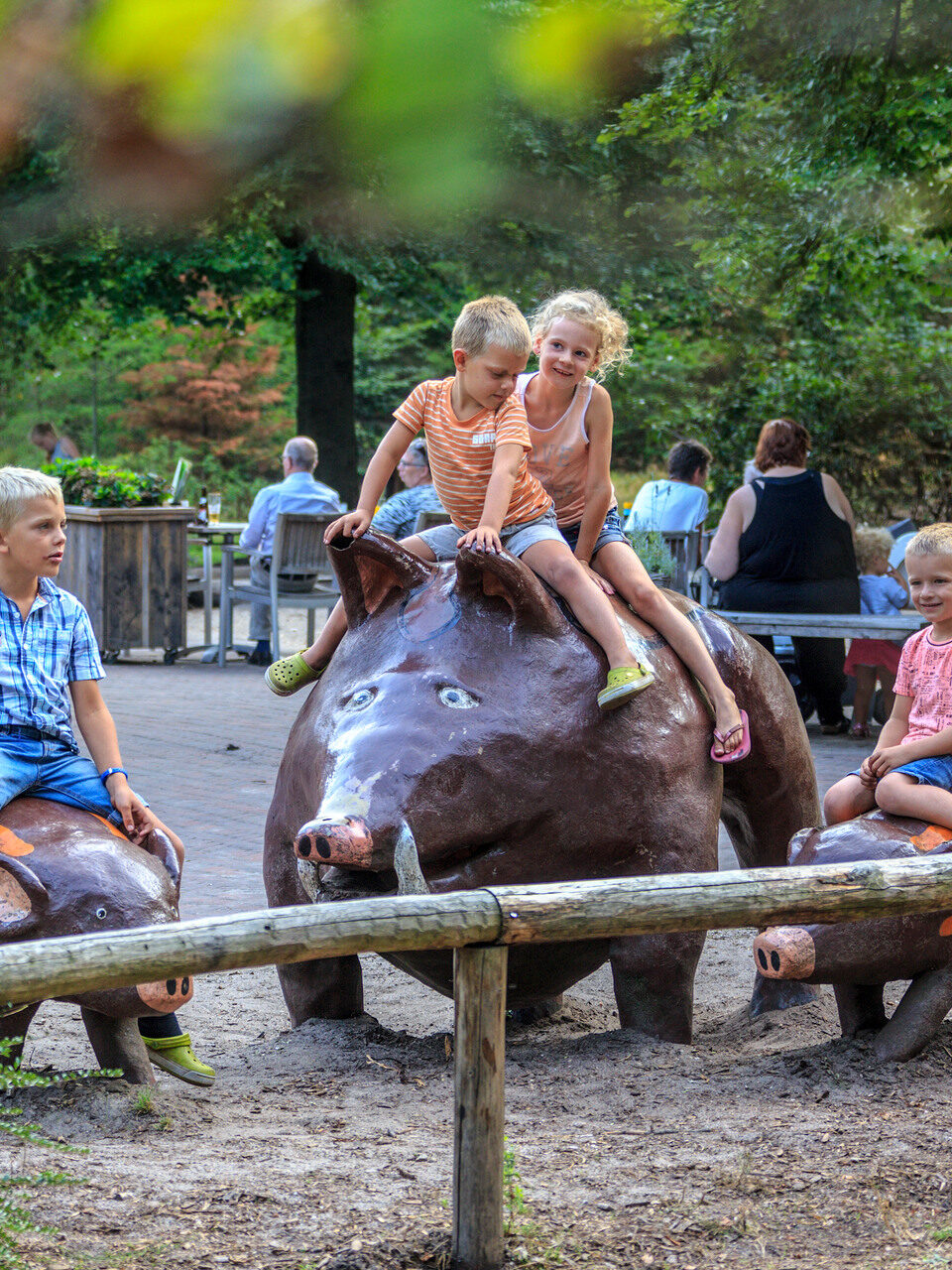 Children playing on one of the Children's Experience Trails in Ede in nature