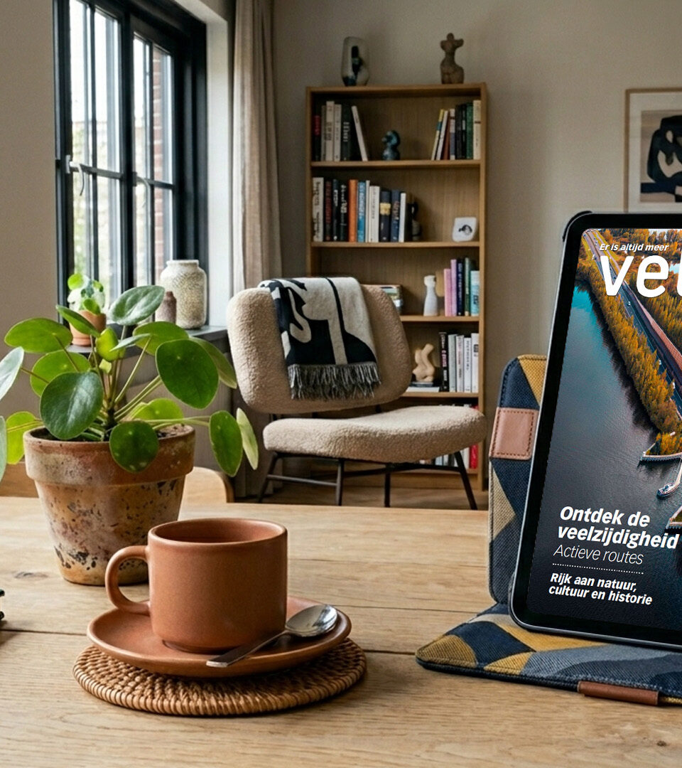 Veluwe magazine op een tablet op een tafel. Deze afbeelding is door AI gegenereerd.
